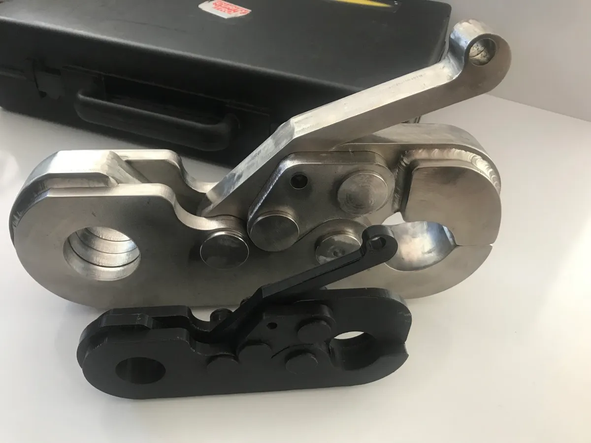 Two PRD WT-series release hooks on a workbench