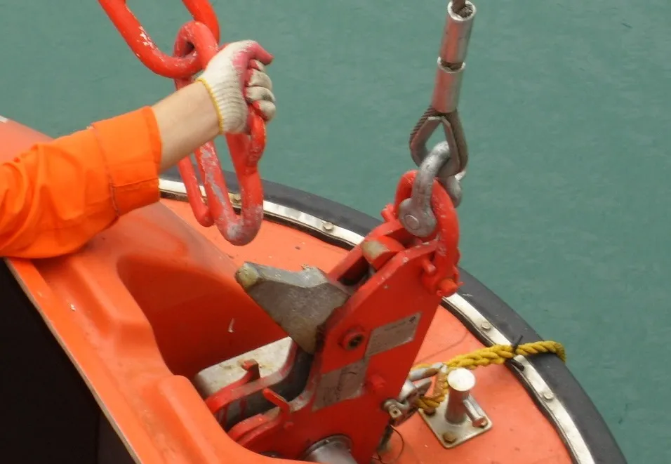 Release hook equipment pictured in a lifeboat application